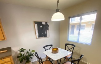 a view of a bathroom with a shower and a lighting fixture at Bowles Apts, Azusa, CA