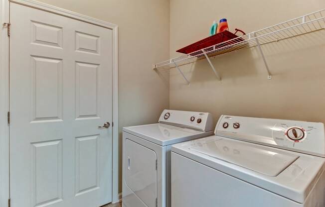 Laundry Room at Magnolia Village Apartments in Jacksonville, FL