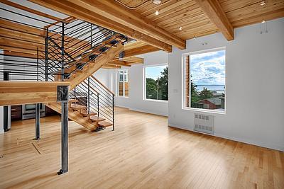 INDUSTRIAL-STYLE QUEEN ANNE TOWNHOUSE WITH VIEWS OF THE WATER FROM EVERY FLOOR!