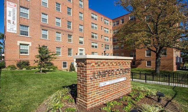 exterior view of juniper courts apartments in washington dc