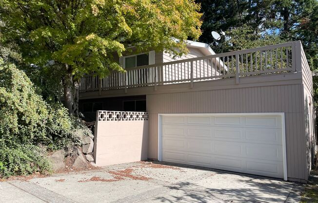 Bellevue 4bed 3bath + Den with extra storage and garage.