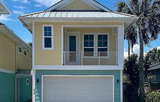 4 Bed 3 Bath Fully Furnished Modern Home with 2 Car Garage just 2 Blocks from the Beach! Pet Friendly with Fenced in Backyard, Second Floor Balcony & Fully Equipped Kitchen!