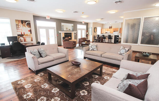 a living room with couches and a coffee table