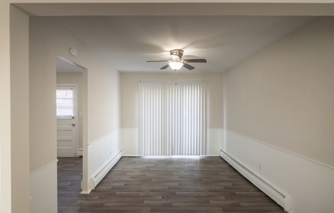This is a photo of the dining room of the 1004 square foot, 2 bedroom/1 bath Townhome with stackable washer/dryer floor plan at Colonial Ridge Apartments in the Pleasant Ridge neighborhood of Cincinnati, OH.