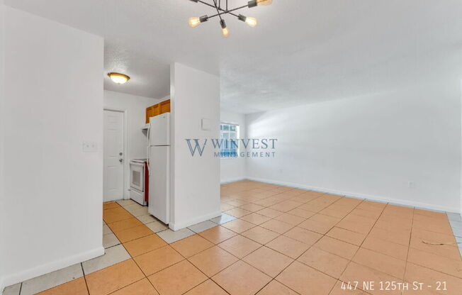 447 NE 125 ST