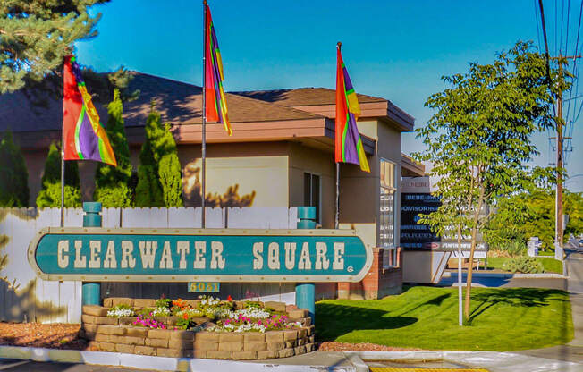 Clearwater Square Apartments Exterior Sign and Flags