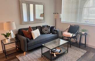a living room with a couch and a coffee table