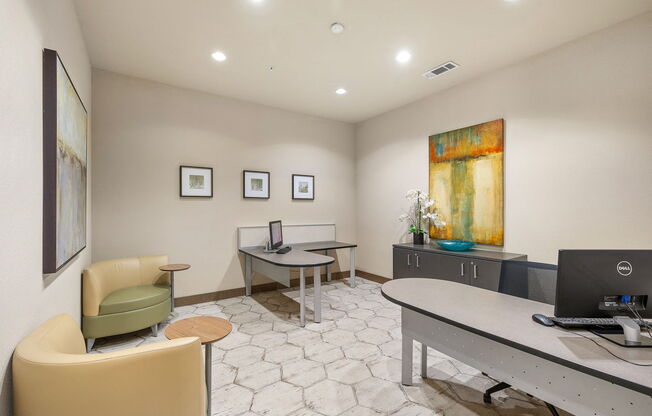 an office with a desk and chairs and a computer at Lakeline East Apartments, Texas