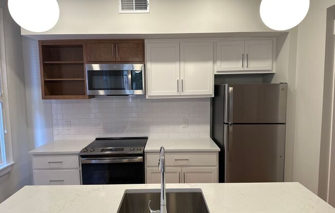 210-218 W 12th