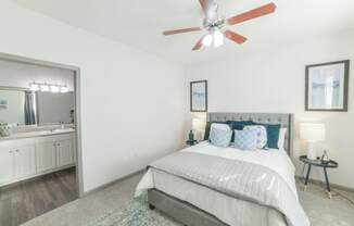 a bedroom with a bed and a ceiling fan at The Shallowford, Chattanooga, Tennessee