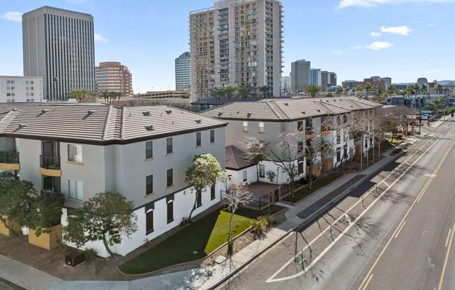 an aerial view of apartments in a city with tall buildings