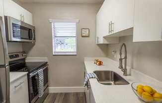 Vue on 67th Model Kitchen with Stainless Steel Appliances