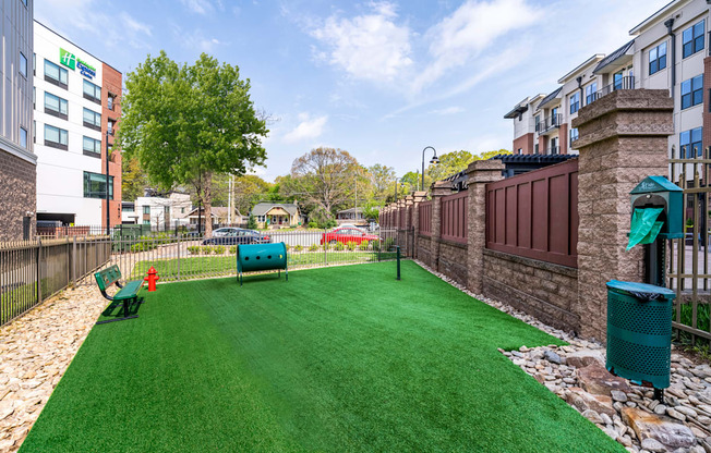 Pet park with benches and agility course