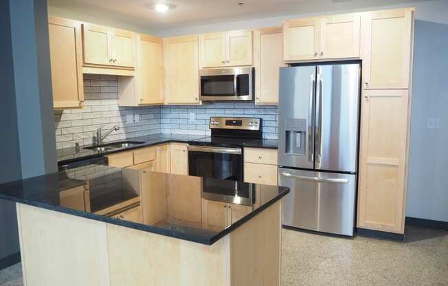 fully renovated kitchens at the historic minnesota building live/work flats