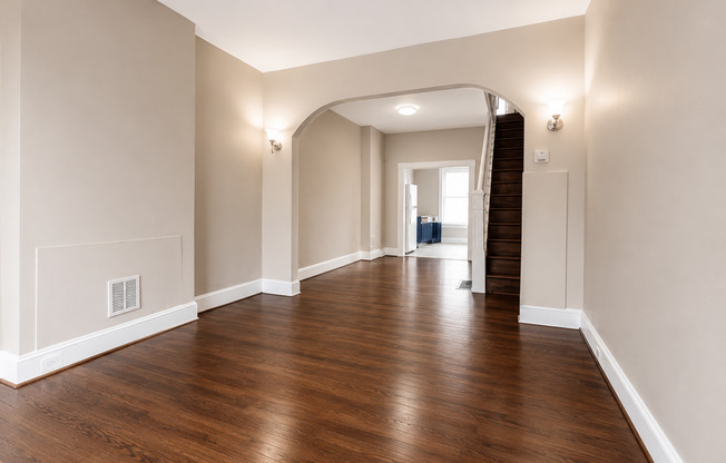 Charming Baltimore Rowhome | 2 Bedrooms + Den | 1 Bathroom | Hardwood Floors & Bonus Basement