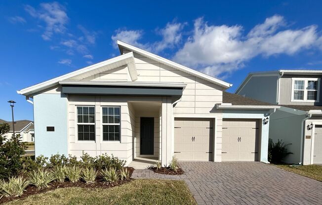 Stunning 3/2 Modern Home with a Covered Patio and a 2 Car Garage in the Summerdale Park at Lake Nona - Orlando!