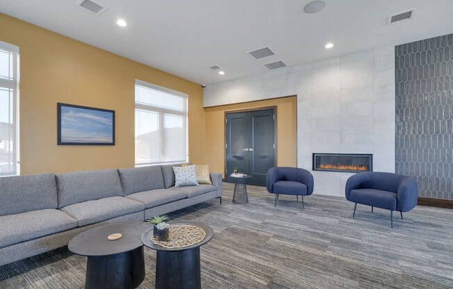 Resident lounge with fireplace and seating at WH Flats luxury apartments in south Lincoln NE