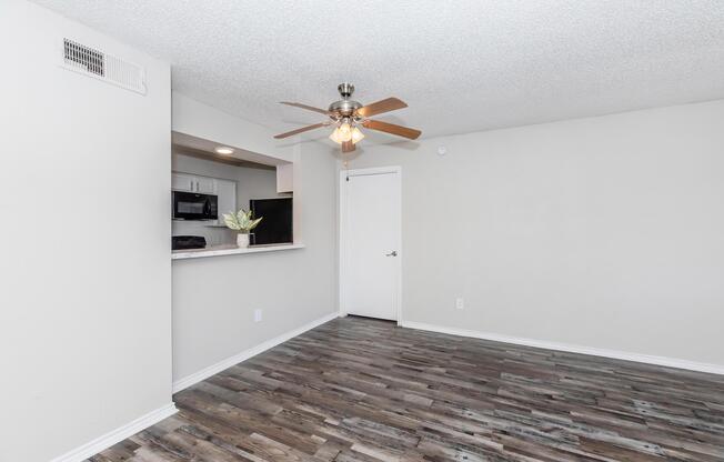 a kitchen with a wood floor