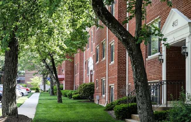 exterior of brick apartment building at cambridge square apartments in bethesda md