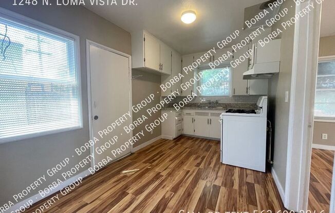 1248 N LOMA VIS DR