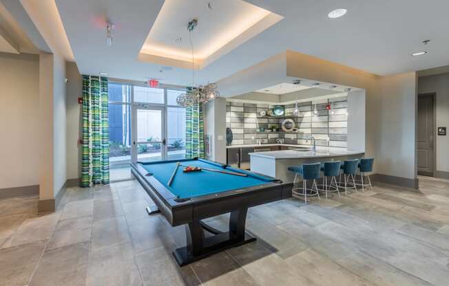 play a game of pool in our clubhouse atrium
