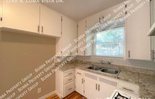 1248 N LOMA VIS DR