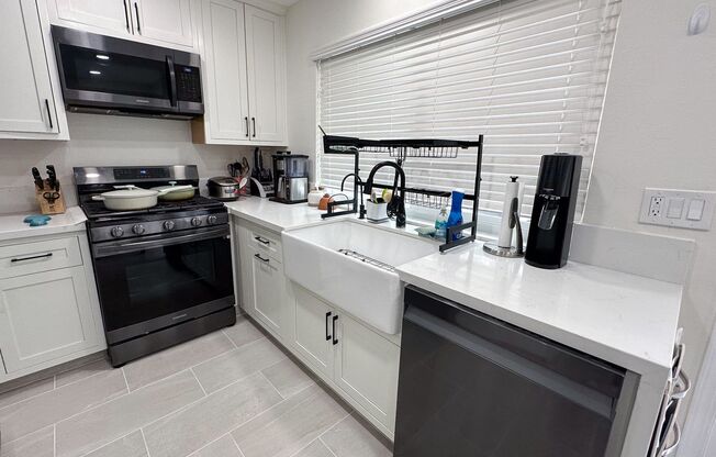 Remodeled 2 Bedroom 1.5 Bath Attached Townhouse,