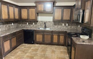 3 bed 2 bath 2 car garage in Chickasha!  granite, luxury vinyl and ready for move in!