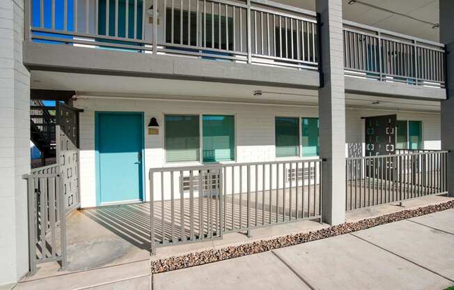 the front of a building with a porch  at Presidio Palms Apartments, Tucson, AZ, Arizona