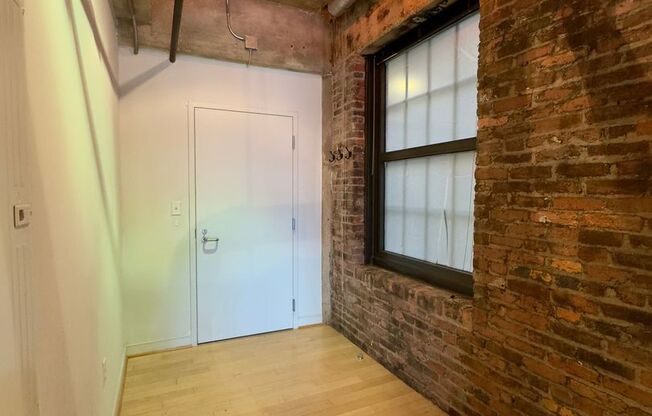 Stunning Industrial-Contemporary One Bedroom Condo- Parking included!