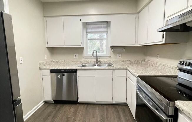 APPLICATION PENDING: 720-A Powell Drive ~Newly Renovated~ End Unit ~ Convenient to Powell Drive Park and NCSU!