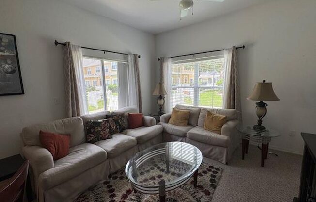 Fully Furnished 4 Bedroom 2 Bathroom Townhome in gated community.