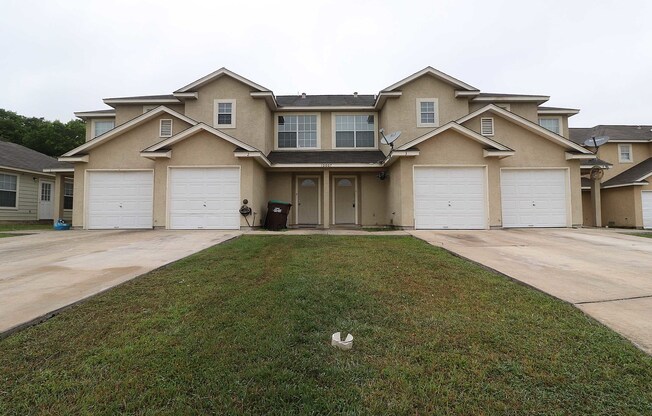 Converse 3 Bedroom Townhouse with Attached One-Car Garage and Large Fenced Backyard