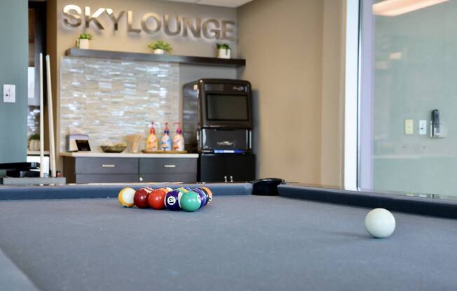 Enjoy a game of pool in our Sky Lounge rooftop amenity.