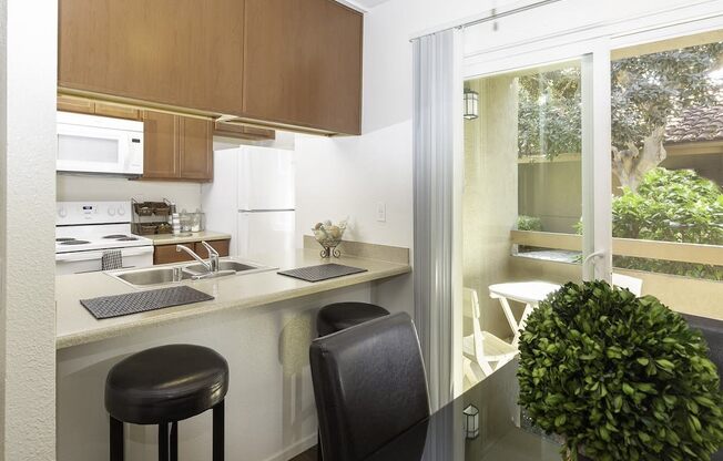 Dining and Kitchen Area at Eucalyptus Grove Apartments, Chula Vista, CA, 91910