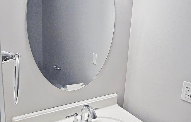 Master bathroom with floating vanities at The Reserves at 1150 Apartments, Integrity Realty LLC, Parma, 44134