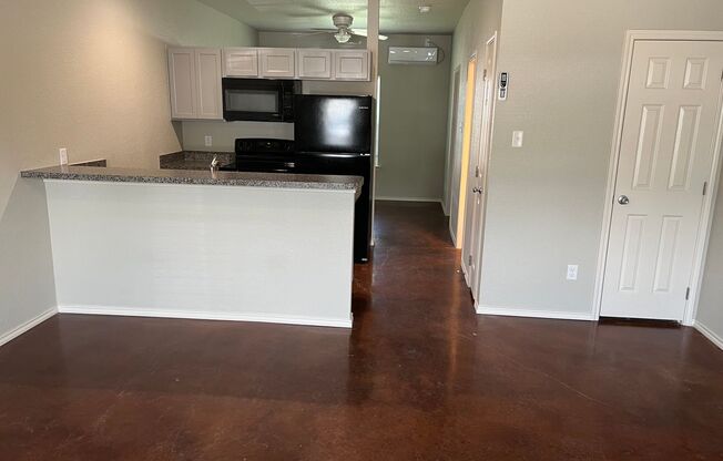 Price Reduced!! FOR LEASE - Nice 1 BR – 1 BA Unit With Stained Concrete Floors, Refrigerator, Microwave & Range. Water, Sewer, Dumpster, Lawn Care & Basic Wi-Fi Included.