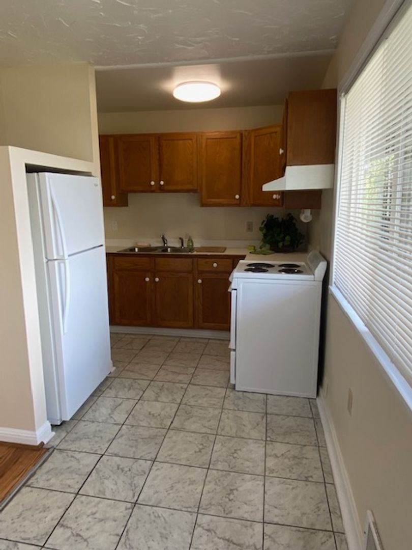 Well-Maintained Two-Story Quadplex Building in Prime Location