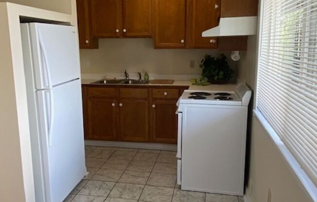 Well-Maintained Two-Story Quadplex Building in Prime Location