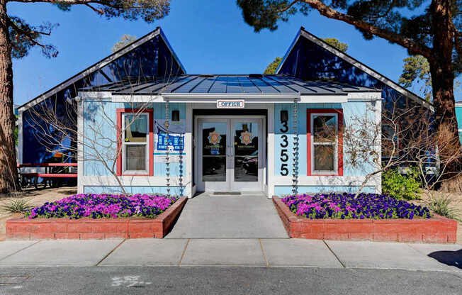 A blue building with the word "OPEN" on the front.