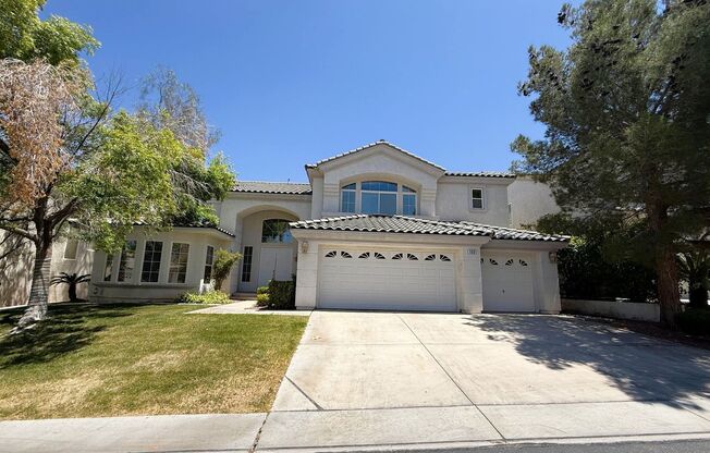 GORGEOUS 2 STORY HOME WITH A GRAND ENTRY & GOLF COURSE VIEW LOCATED INSIDE THE COMMUNITY OF RHODES RANCH