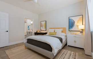 a bedroom with a bed and a closet