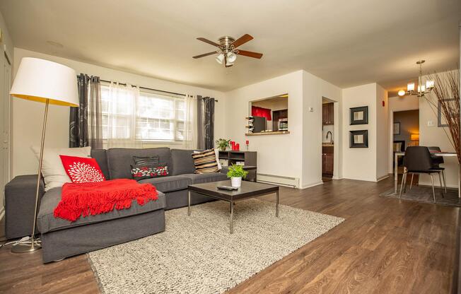 a living room filled with furniture and a fire place