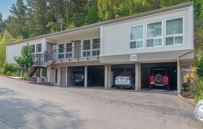 a large building with cars parked in the garage