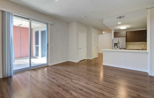 Living Room with Balcony and Hard Surface Flooring