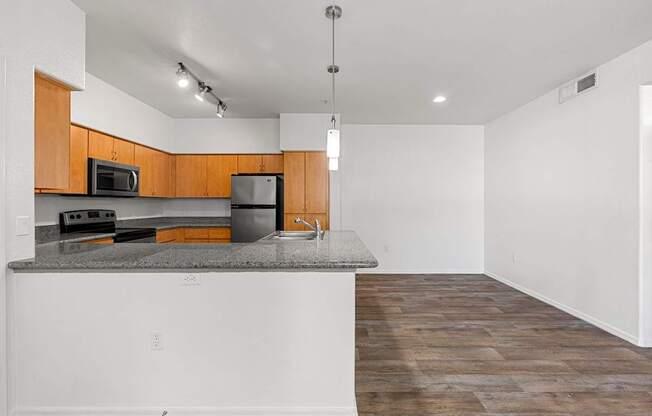 A kitchen with a countertop and cabinets.