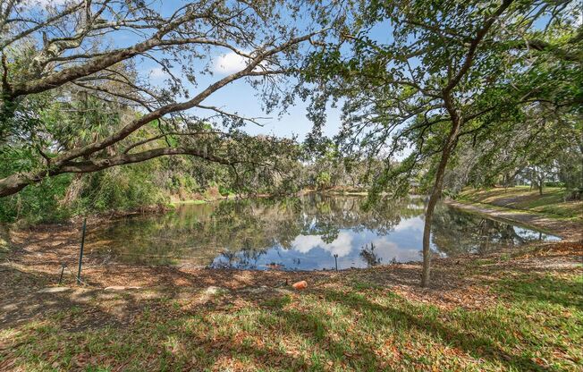 Lakeview corner condo in the desirable Raintree Village community! This 3-bedroom, 2-bath second-floor unit