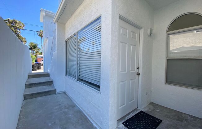 BLOCKS from the BEACH and Bay! Spacious 3 Bedroom in PB! Garage Storage! On Site Laundry!