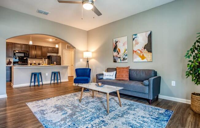 Living Room with couch, table, and chairs at the Flats at Sundown in North Port, Florida