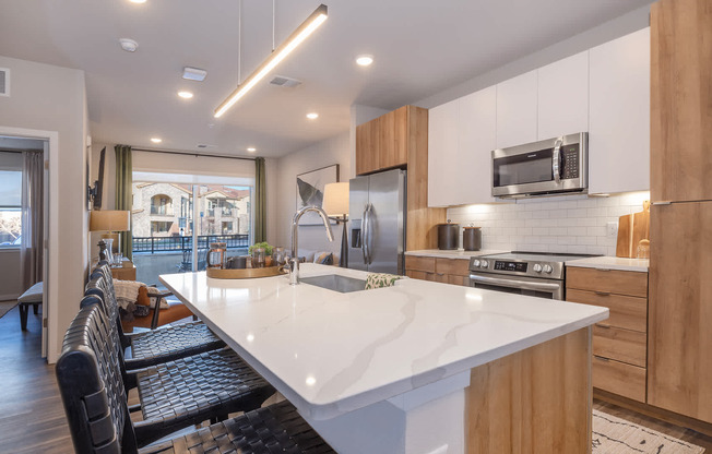 Kitchen with Stainless Steel Appliances and Quartz Countertops